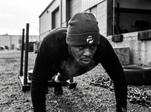 Load image into Gallery viewer, Physical Icon Beanie — running — black and white editorial