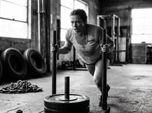 Load image into Gallery viewer, Get Physical Fighter Tees — running — black and white editorial