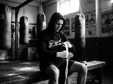 Load image into Gallery viewer, Mainland Hoodie — getting ready — black and white editorial