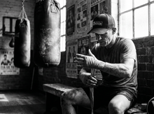Load image into Gallery viewer, PHYSICAL Boxer Low Profile Mesh Back Trucker Hat — getting ready — black and white editorial