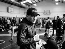 Load image into Gallery viewer, Physical Coach Low Profile Mesh Back Trucker Hat — tournament — black and white editorial