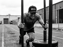 Load image into Gallery viewer, PHYSICAL Fighter Low Profile Mesh Back Trucker Hat — running — black and white editorial