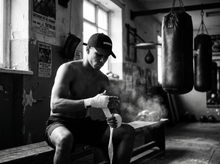 Load image into Gallery viewer, Physical Undercover Hat — getting ready — black and white editorial