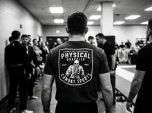 Load image into Gallery viewer, Skull Grappler T-Shirt — tournament — black and white editorial