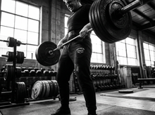 Load image into Gallery viewer, Physical Athlete Badge Sweats — lifting — black and white editorial