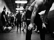 Load image into Gallery viewer, Physical Wrestler Sweat Pants — tournament — black and white editorial